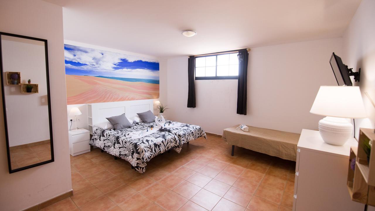 Chambre Très Spacieuse avec Salle de Bains Commune